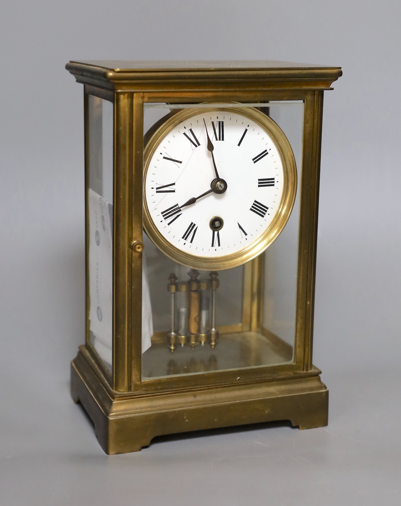 A Vermont, crystal time four glass regulator clock, 24 cms high